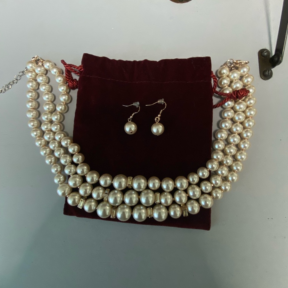 Pearl necklace and earring set.